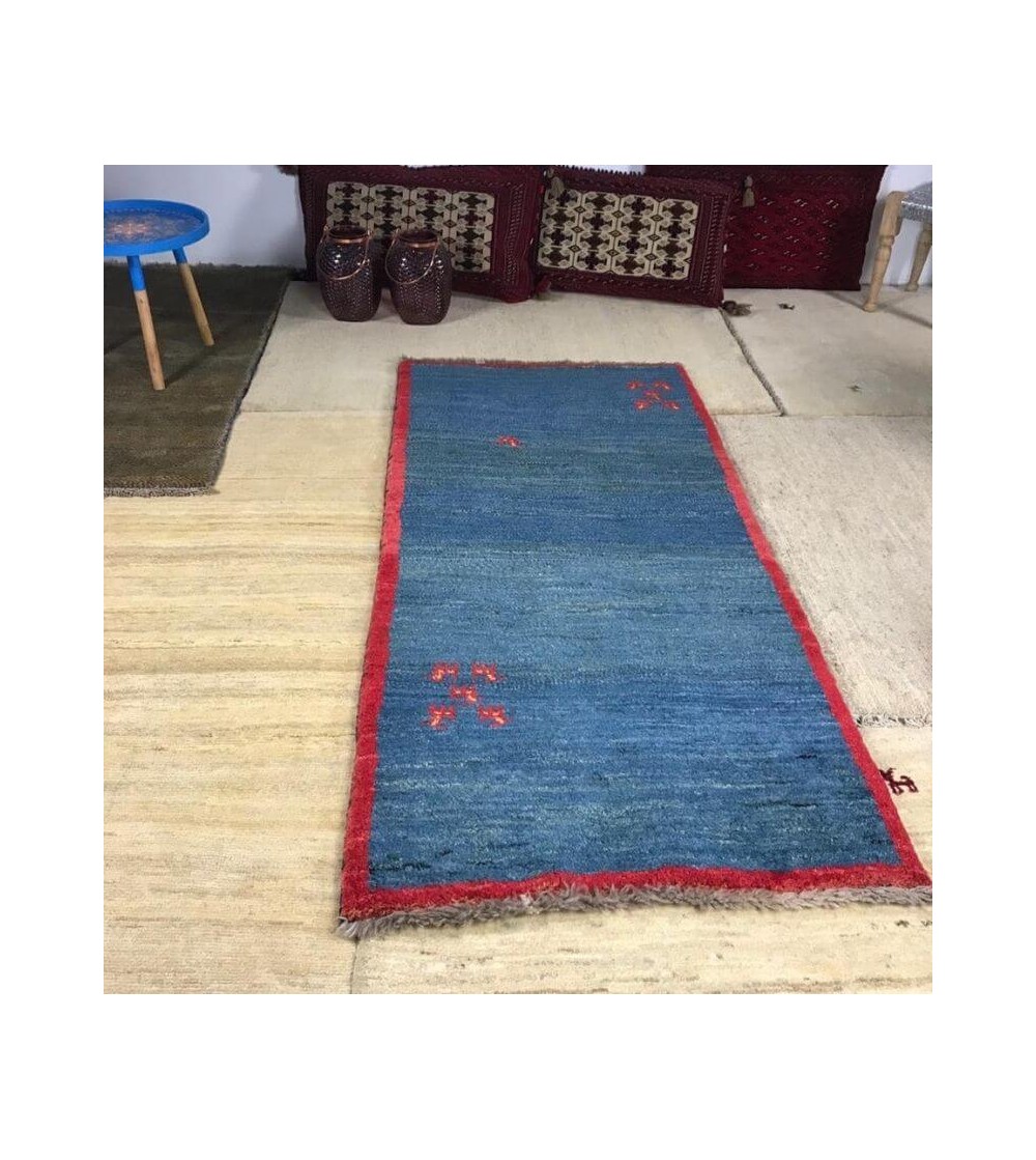 Alfombra étnica moderna persa cenefa  azul y roja producto