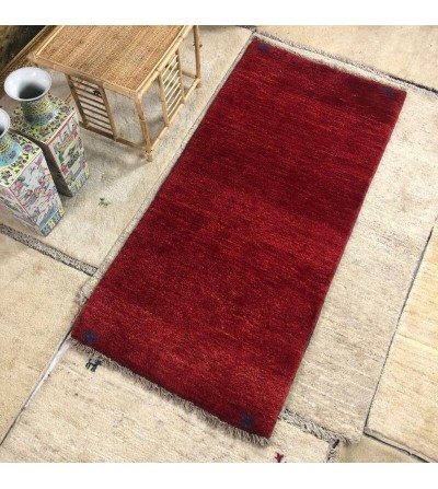 Alfombra étnica moderna persa lisa color rojo producto