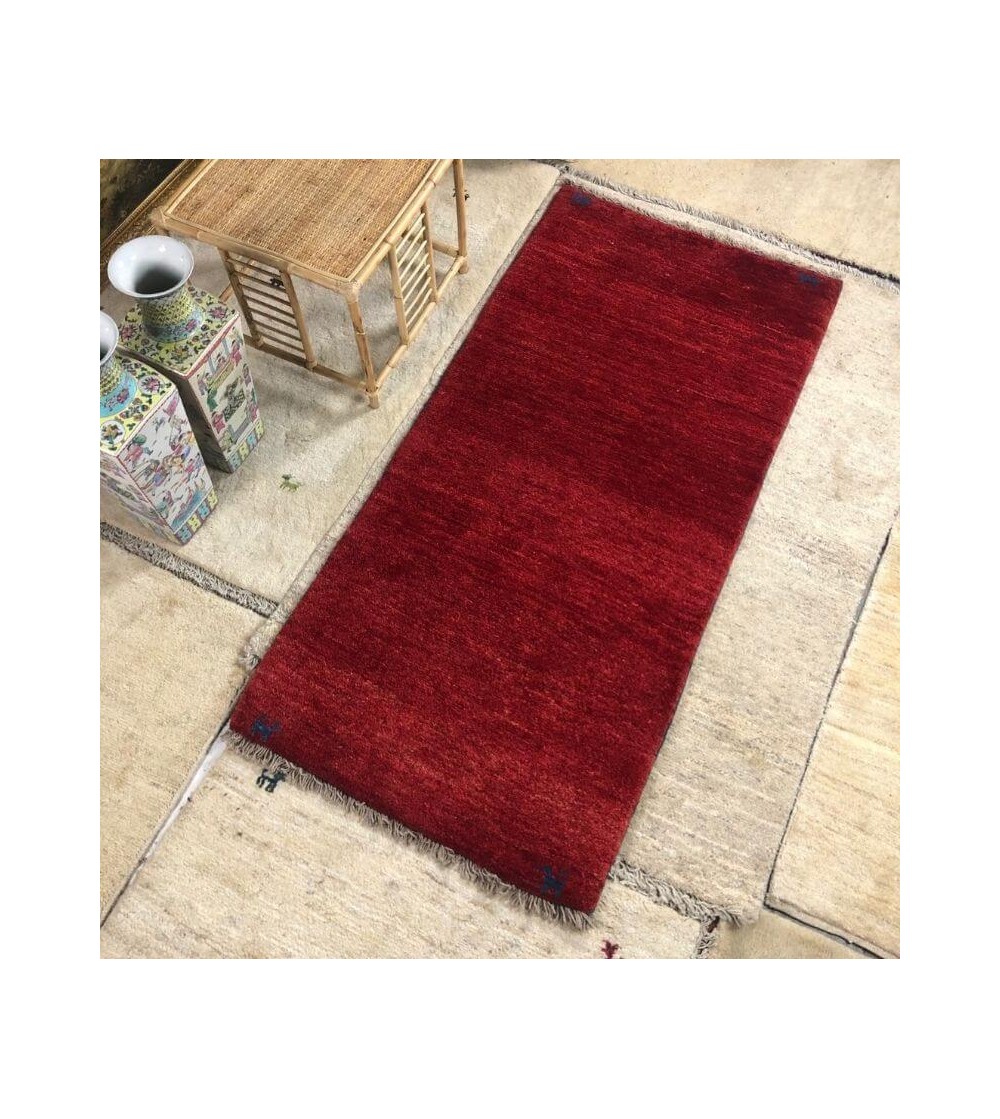 Alfombra étnica moderna persa lisa color rojo producto