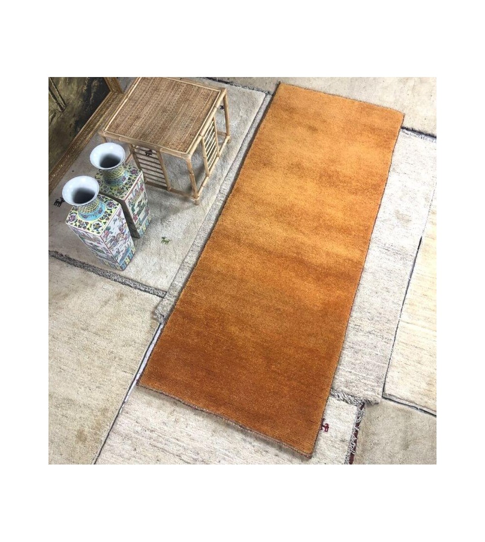 Alfombra étnica moderna persa lisa color oro producto